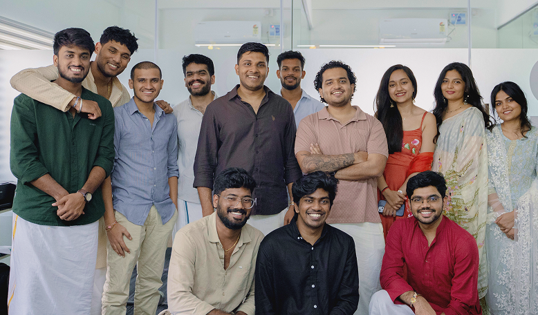 A group photo of the Updot team celebrating